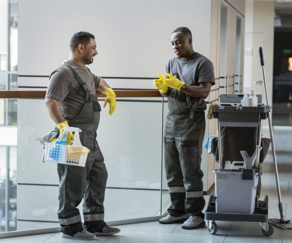 full shot men wearing equipment scaled