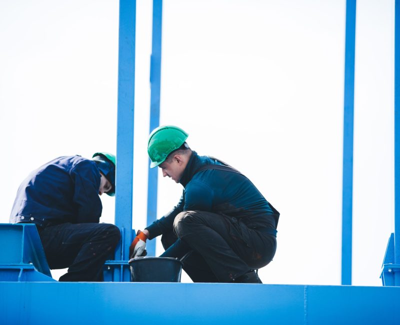 manual workers working shipyard construction site industry scaled manual workers working shipyard construction site industry scaled